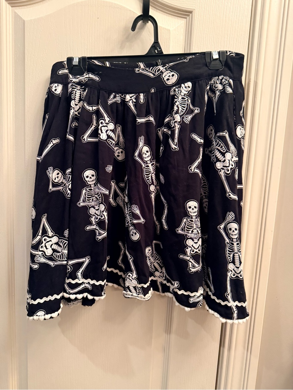 Sourpuss black skirt w/ pockets & skeleton print, women's size medium